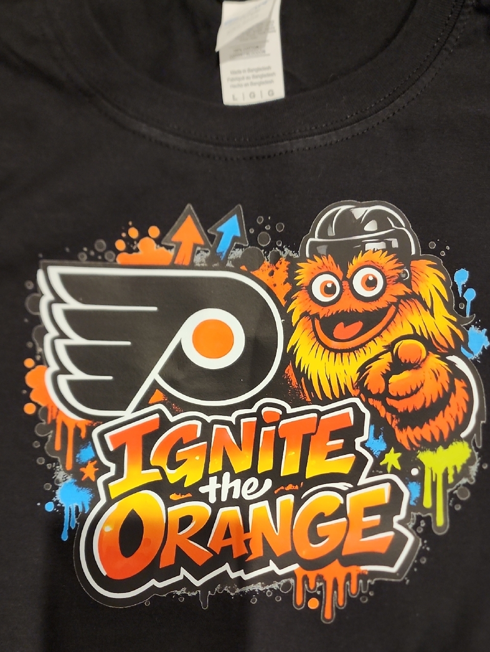 Black Flyers Gritty Ignite The Orange Tee